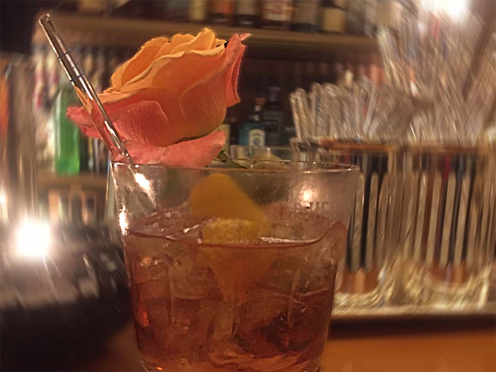 A drink at the Hemingway Bar in the Paris Ritz, garnished with a rose